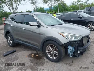 2017 Hyundai Santa Fe 2.4L with VIN 5NMZU3LB2HH014844, listed as a IAAI auction lot 42657624 with 93,533 mi miles and . Bid and sale history available at DreamBid. Image 1.