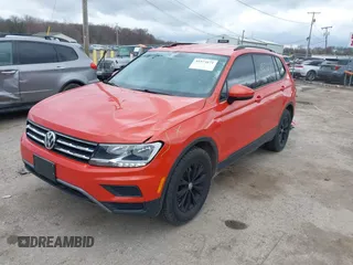 2018 Volkswagen Tiguan S z VIN 3VV0B7AX4JM124500, wystawiony jako IAAI lot #41974671 z przebiegiem 76 970 mil mil oraz . Historia ofert i sprzedaży dostępna na DreamBid. Obrazek 2.