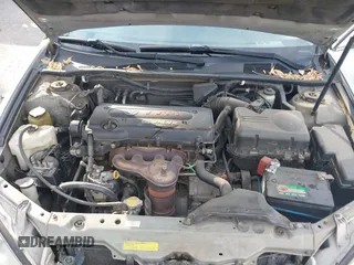 2005 Toyota Camry STD z VIN 4T1BE32K45U399095, wystawiony jako IAAI lot #41609211 z przebiegiem 244 705 mil mil oraz . Historia ofert i sprzedaży dostępna na DreamBid. Obrazek 10.