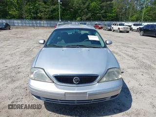 2003 Mercury Sable GS z VIN 1MEFM50213A611357, wystawiony jako IAAI lot #42142256 z przebiegiem 170 396 mil mil oraz . Historia ofert i sprzedaży dostępna na DreamBid. Obrazek 6.