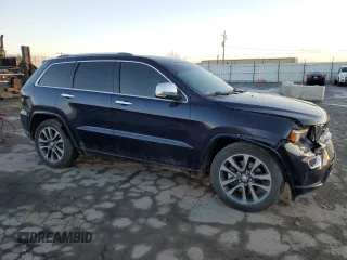 2017 Jeep Grand Cherokee Overland with VIN 1C4RJFCT0HC952052, listed as a Copart auction lot 85064124 with 184,206 mi miles and Salvage Title. Bid and sale history available at carsss.com. Image 4.