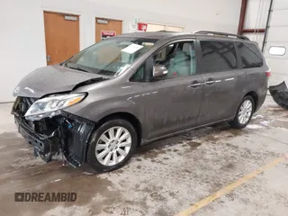 2015 Toyota Sienna Ltd with VIN 5TDDK3DC3FS106157, listed as a IAAI auction lot 41737202 with 173,724 mi miles. Bid and sale history available at carsss.com. Image 2.