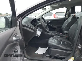 2015 Ford Focus SE with VIN 1FADP3K27FL387012, listed as a IAAI auction lot 42100945 with 85,588 mi miles. Bid and sale history available at carsss.com. Image 5.