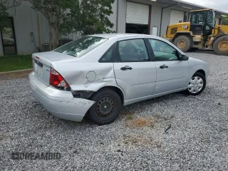 2005 Ford Focus S with VIN 1FAFP34N55W115653, listed as a Copart auction lot 63043315 with 110,593 mi miles and Salvage title. Bid and sale history available at DreamBid. Image 3.