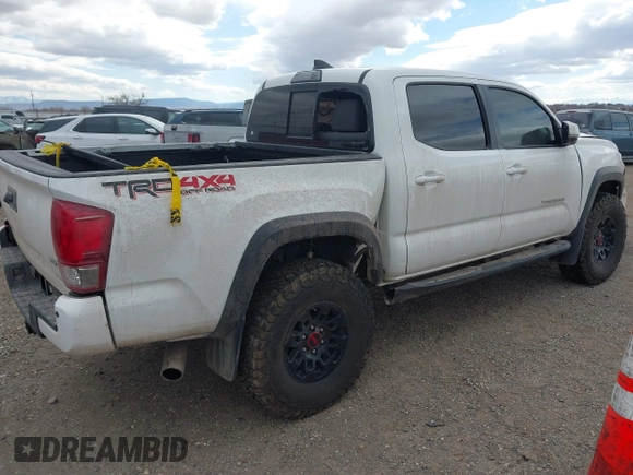 2017 Toyota Tacoma SR5 z VIN 3TMCZ5AN8HM077203, wystawiony jako IAAI lot #41765910 z przebiegiem 170 863 mil mil oraz . Historia ofert i sprzedaży dostępna na DreamBid. Obrazek 4.