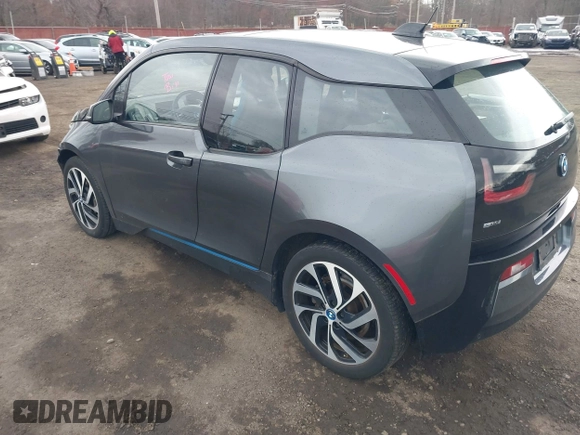 2017 BMW i3 z VIN WBY1Z8C39HV891353, wystawiony jako IAAI lot #41887562 z przebiegiem 82 295 mil mil oraz . Historia ofert i sprzedaży dostępna na DreamBid. Obrazek 3.