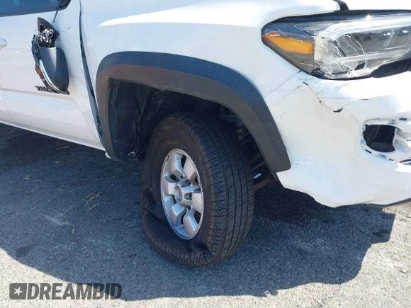 2023 Toyota Tacoma SR5 z VIN 3TMDZ5BN5PM148049, wystawiony jako IAAI lot #41648232 z przebiegiem 22 570 mil mil oraz . Historia ofert i sprzedaży dostępna na DreamBid. Obrazek 6.