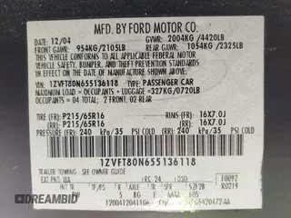 2005 Ford Mustang Deluxe with VIN 1ZVFT80N655136118, listed as a IAAI auction lot 41811969 with 104,071 mi miles. Bid and sale history available at carsss.com. Image 9.