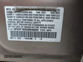2005 Honda Pilot EX-L with VIN 5FNYF18505B040059, listed as a IAAI auction lot 41656782 with 234,723 mi miles. Bid and sale history available at carsss.com. Image 9.