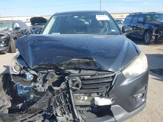 2016 Mazda CX-5 Touring with VIN JM3KE2CY6G0808992, listed as a IAAI auction lot 40969655 with 132,513 mi miles. Bid and sale history available at carsss.com. Image 12.