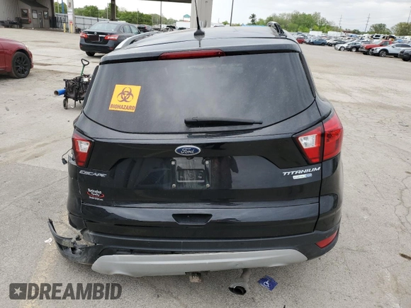 2019 Ford Escape Titanium с VIN 1FMCU9J92KUA82033, выставлен на аукционе Copart как лот 56686235 с пробегом Не указан миль и Списание • Salvage title. История ставок и продаж доступна на DreamBid. Изображение 6.
