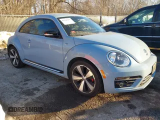 2014 Volkswagen Beetle Turbo R-Line with VIN 3VWVT7AT9EM661347, listed as a IAAI auction lot 41336295 with 61,068 mi miles and . Bid and sale history available at DreamBid. Image 1.