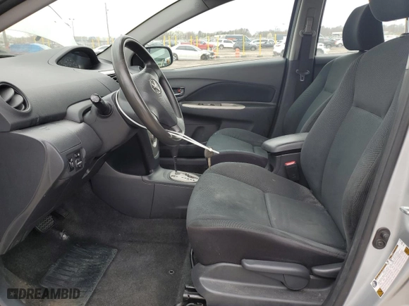 2011 Toyota Yaris with VIN JTDBT4K36B1398830, listed as a Copart auction lot 51169435 with 252,578 mi miles and Clean Title. Bid and sale history available at carsss.com. Image 7.