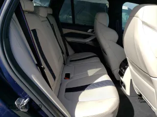 2021 BMW X5 M z VIN 5YMJU0C02M9E48899, wystawiony jako Copart lot #62313822 z przebiegiem 18 708 mil mil oraz . Historia ofert i sprzedaży dostępna na DreamBid. Obrazek 6.