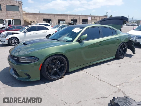 2021 Dodge Charger R/T with VIN 2C3CDXCT0MH652199, listed as a IAAI auction lot 42051678 with 11,798 mi miles and . Bid and sale history available at carsss.com. Image 2.