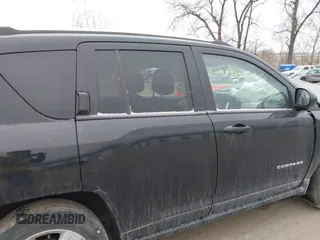2014 Jeep Compass Latitude with VIN 1C4NJCEA8ED550147, listed as a IAAI auction lot 41405446 with 127,240 mi miles. Bid and sale history available at carsss.com. Image 12.