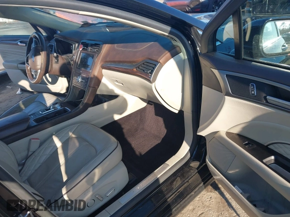 2017 Ford Fusion Titanium with VIN 3FA6P0SU2HR309895, listed as a IAAI auction lot 40963527 with 80,761 mi miles and . Bid and sale history available at DreamBid. Image 5.