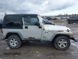 2006 Jeep Wrangler X with VIN 1J4FA39S46P789017, listed as a IAAI auction lot 41904218 with 240,507 mi miles. Bid and sale history available at carsss.com. Image 13.