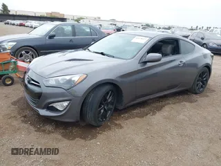 2013 Hyundai Genesis Coupe Premium z VIN KMHHT6KD1DU099404, wystawiony jako IAAI lot #42379613 z przebiegiem 110 507 mil mil oraz . Historia ofert i sprzedaży dostępna na DreamBid. Obrazek 2.