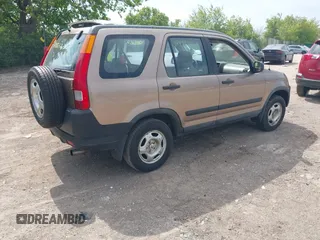 2003 Honda CR-V LX z VIN SHSRD78423U104208, wystawiony jako IAAI lot #42488652 z przebiegiem 214 049 mil mil oraz . Historia ofert i sprzedaży dostępna na DreamBid. Obrazek 4.