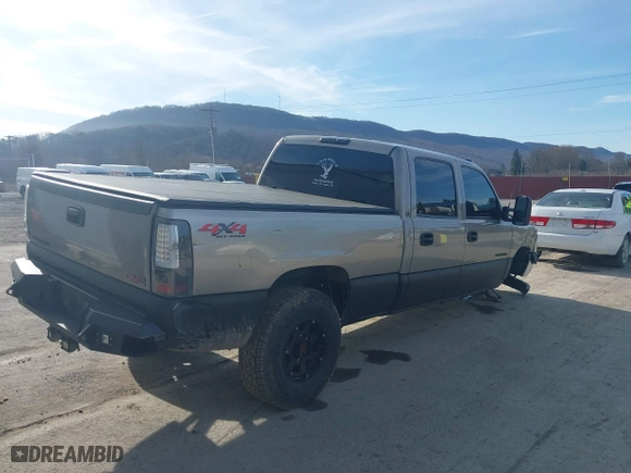 2002 GMC Sierra 2500HD SLE with VIN 1GTHK23U12F248328, listed as a IAAI auction lot 41806690 with 235,807 mi miles. Bid and sale history available at carsss.com. Image 4.