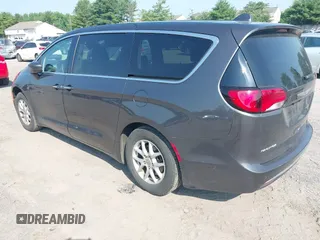 2020 Chrysler Pacifica Touring with VIN 2C4RC1FG6LR120775, listed as a IAAI auction lot 42562876 with 119,853 mi miles and . Bid and sale history available at DreamBid. Image 3.