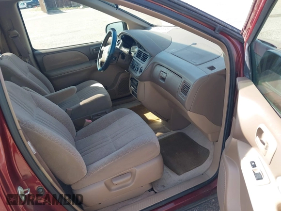 2002 Toyota Sienna CE with VIN 4T3ZF19CX2U491877, listed as a IAAI auction lot 42012361 with 59,776 mi miles. Bid and sale history available at carsss.com. Image 5.