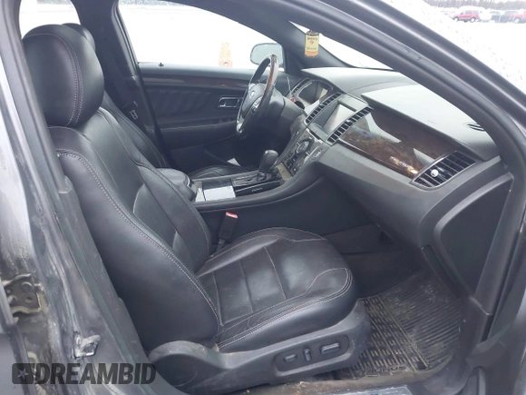 2013 Ford Taurus Limited with VIN 1FAHP2F81DG206437, listed as a IAAI auction lot 41942116 with 194,336 mi miles. Bid and sale history available at carsss.com. Image 5.