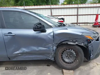 2023 Toyota Corolla Cross L with VIN 7MUAAAAG9PV047205, listed as a IAAI auction lot 41898077 with 29,184 mi miles and . Bid and sale history available at DreamBid. Image 16.