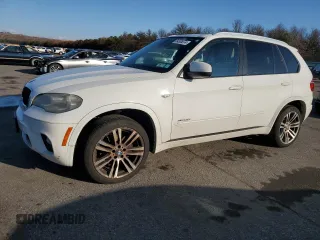 2012 BMW X5 35i with VIN 5UXZV4C55CL747778, listed as a Copart auction lot 84335374 with 144,258 mi miles and Non repairable. Bid and sale history available at DreamBid. Image 1.