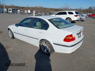 2002 BMW 3 Series 325i with VIN WBAET37492NG77657, listed as a IAAI auction lot 41691705 with 163,700 mi miles. Bid and sale history available at carsss.com. Image 3.