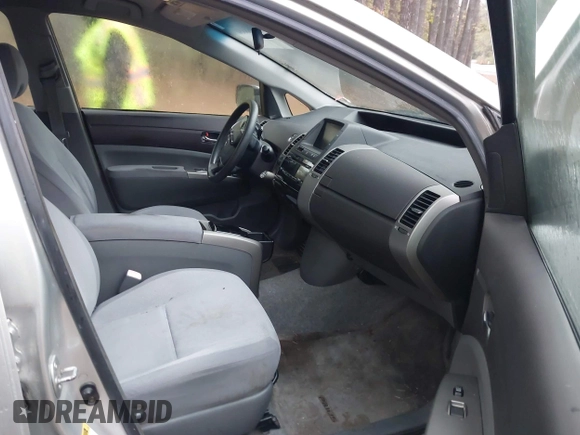 2005 Toyota Prius with VIN JTDKB20U557032555, listed as a IAAI auction lot 40868857 with 236,696 mi miles. Bid and sale history available at carsss.com. Image 5.