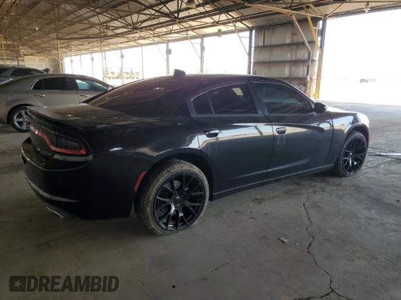 2015 Dodge Charger SXT with VIN 2C3CDXJG9FH748809, listed as a Copart auction lot 61682335 with 128,252 mi miles and Salvage title. Bid and sale history available at DreamBid. Image 3.