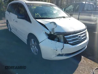 2012 Honda Odyssey Touring with VIN 5FNRL5H93CB146753, listed as a IAAI auction lot 41984850 with 155,309 mi miles and . Bid and sale history available at DreamBid. Image 6.