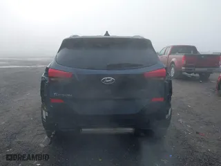 2019 Hyundai Tucson Value with VIN KM8J33A44KU995257, listed as a IAAI auction lot 41672206 with 63,090 mi miles. Bid and sale history available at carsss.com. Image 17.