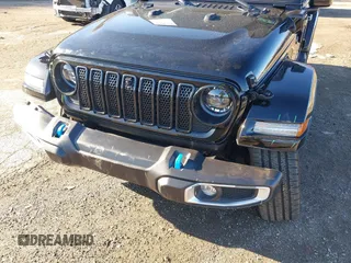 2024 Jeep Wrangler Sahara with VIN 1C4RJXP62RW126989, listed as a IAAI auction lot 41816525 with 11,241 mi miles and . Bid and sale history available at DreamBid. Image 6.