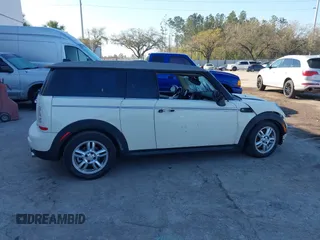 2013 MINI Clubman z VIN WMWZF3C54DT491236, wystawiony jako IAAI lot #41663705 z przebiegiem 90 046 mil mil oraz . Historia ofert i sprzedaży dostępna na DreamBid. Obrazek 13.