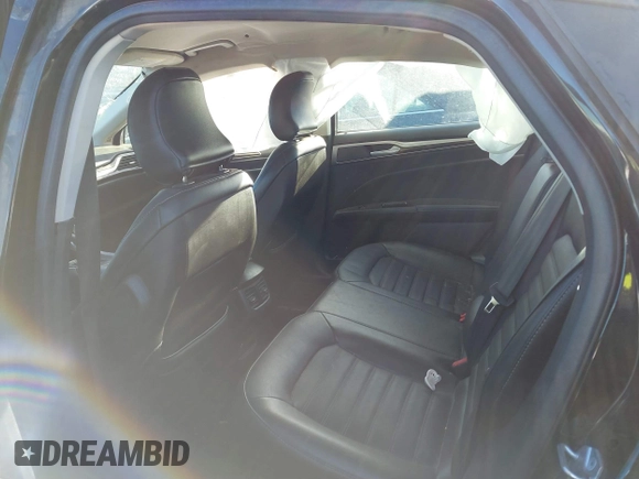 2016 Ford Fusion Energi SE Luxury with VIN 3FA6P0PU5GR373212, listed as a IAAI auction lot 41875297 with 93,049 mi miles. Bid and sale history available at carsss.com. Image 8.