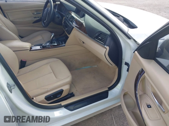 2014 BMW 3 Series 328i with VIN WBA3A5C5XEJ463938, listed as a IAAI auction lot 42103330 with 194,263 mi miles and . Bid and sale history available at DreamBid. Image 5.