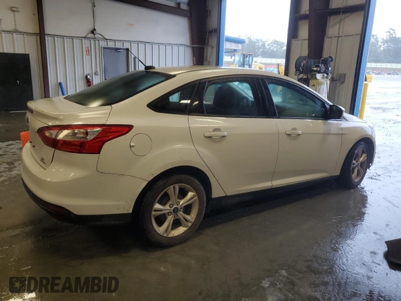 2014 Ford Focus SE with VIN 1FADP3F25EL449810, listed as a Copart auction lot 73174364 with 140,031 mi miles and Salvage Title. Bid and sale history available at DreamBid. Image 3.