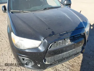 2014 Mitsubishi Outlander Sport ES with VIN 4A4AP3AU7EE005024, listed as a IAAI auction lot 41610686 with 127,033 mi miles. Bid and sale history available at carsss.com. Image 6.