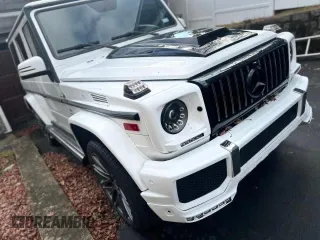 2002 Mercedes-Benz G-Class with VIN WDCYR49E22X132146, listed as a Copart auction lot 87416074 with 208,917 mi miles and Salvage Title. Bid and sale history available at carsss.com. Image 1.