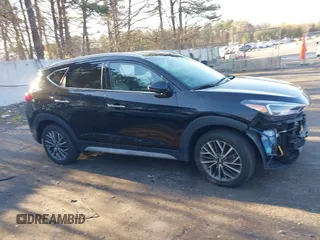 2021 Hyundai Tucson Ultimate with VIN KM8J3CAL8MU351335, listed as a IAAI auction lot 42056351 with 49,145 mi miles and . Bid and sale history available at DreamBid. Image 14.