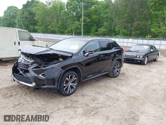 2016 Lexus RX 350 z VIN 2T2ZZMCA8GC005158, wystawiony jako IAAI lot #42105589 z przebiegiem 125 337 mil mil oraz . Historia ofert i sprzedaży dostępna na DreamBid. Obrazek 2.