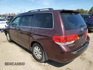 2010 Honda Odyssey EX-L with VIN 5FNRL3H60AB041353, listed as a Copart auction lot 52801315 with 120,253 mi miles and Salvage Title. Bid and sale history available at DreamBid. Image 2.