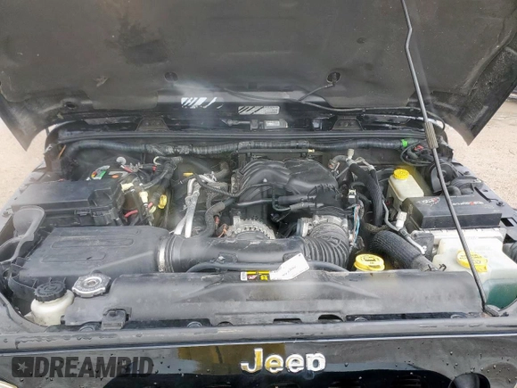 2015 Jeep Wrangler Unlimited Rubicon Hard Rock with VIN 1C4HJWFG1FL710264, listed as a Copart auction lot 54123285 with 96,737 mi miles and Salvage title. Bid and sale history available at DreamBid. Image 12.