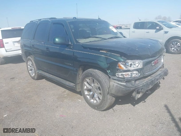 2004 GMC Yukon Denali with VIN 1GKEK63U24J265167, listed as a IAAI auction lot 41877785 with 256,691 mi miles. Bid and sale history available at carsss.com. Image 1.