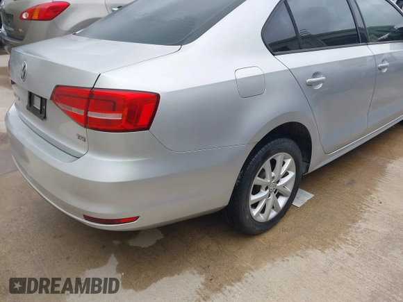 2015 Volkswagen Jetta Sedan 1.8T SE with VIN 3VWD17AJ8FM336528, listed as a IAAI auction lot 42013023 with 89,972 mi miles. Bid and sale history available at carsss.com. Image 6.