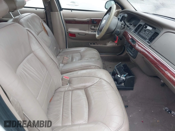 2001 Mercury Grand Marquis LS with VIN 2MEFM75W41X672360, listed as a IAAI auction lot 41418594 with 73,717 mi miles and . Bid and sale history available at DreamBid. Image 5.