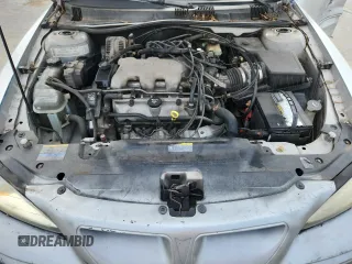 2004 Pontiac Grand Am SE1 with VIN 1G2NF52E74M687538, listed as a Copart auction lot 60922655 with 139,795 mi miles and Salvage title. Bid and sale history available at DreamBid. Image 11.